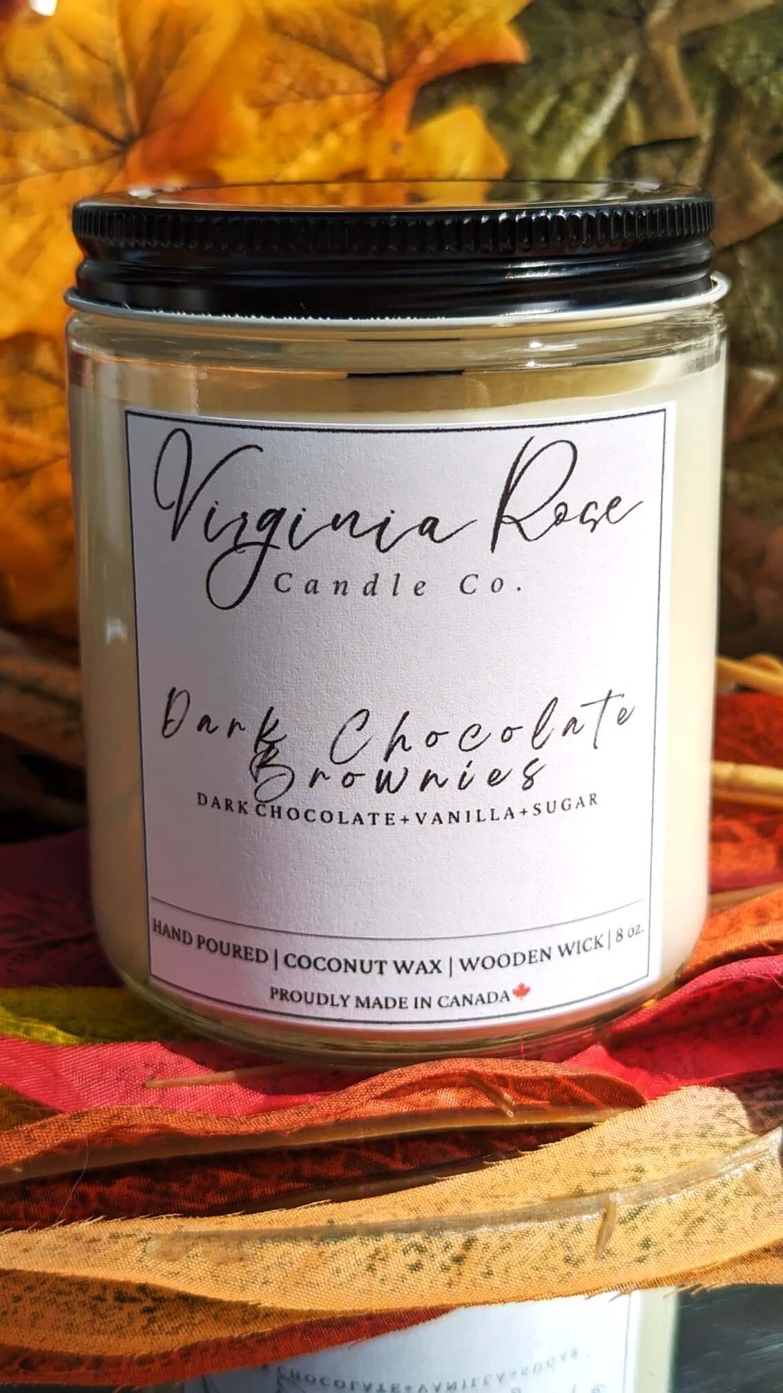 Jar with black lid with Virginia Rose Candle Co. Logo printed on it. The candle scent is Dark Chocolate Brownies.